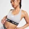 The North Face Tape Sports Bra Damen -Modische Sportbekleidung jd 610508 a